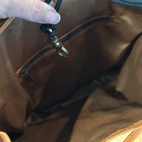 Genuine leather cognac colored bucket shoulder bag with cinch close. - Picture 5 of 5